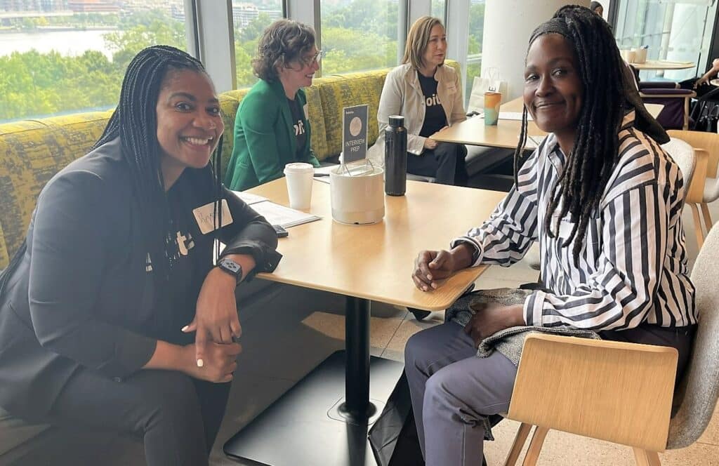 Teresa and Krystal at Deloitte Career Day.